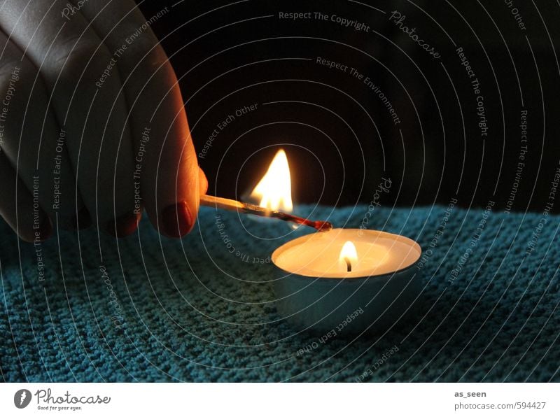 Light a candle Hand Fingers Fire Autumn Winter Candle Touch Relaxation Illuminate Warmth Yellow Orange Turquoise White Moody Safety (feeling of)