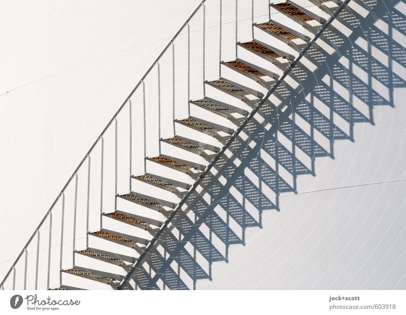Stairs from time to time Silo White Symmetry Irritation rail Diagonal Illusion Shadow play Detail Abstract Structures and shapes Neutral Background Silhouette