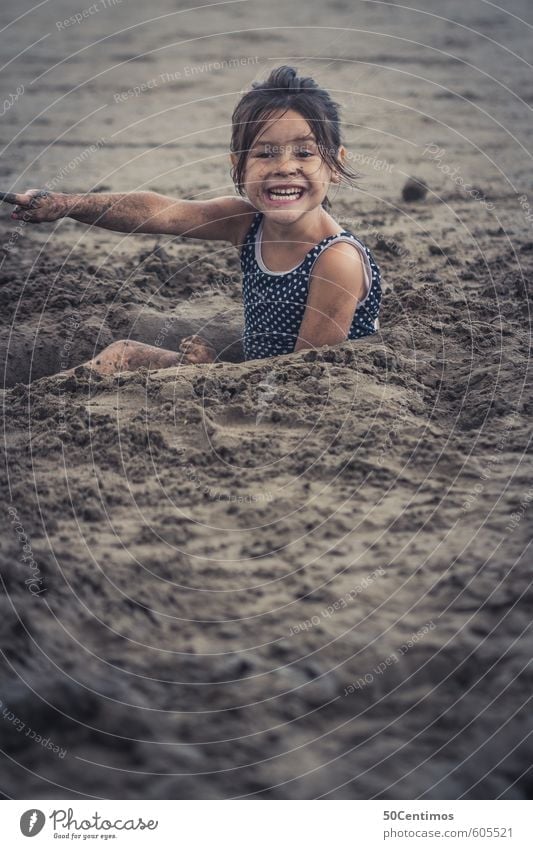 Playing sand on the sandy beach Luxury Leisure and hobbies Children's game Vacation & Travel Tourism Trip Far-off places Summer Summer vacation Sun Beach Ocean