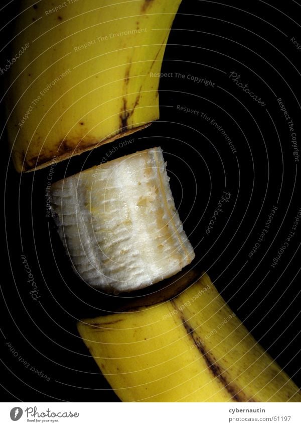 rotten and tummy free Banana Spoiled Brown Yellow Fruit Section of image Banana skin Cut Divided Division Part Detail Colour photo Brownish Dark background
