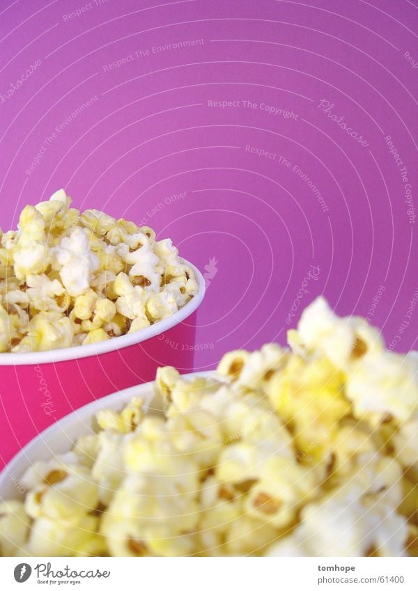 pink pop Popcorn Snack Cinema Pink Violet Leisure and hobbies Nutrition Fairs & Carnivals Sugar Sweet Salty Mug Close-up Food Maize Grain Still Life