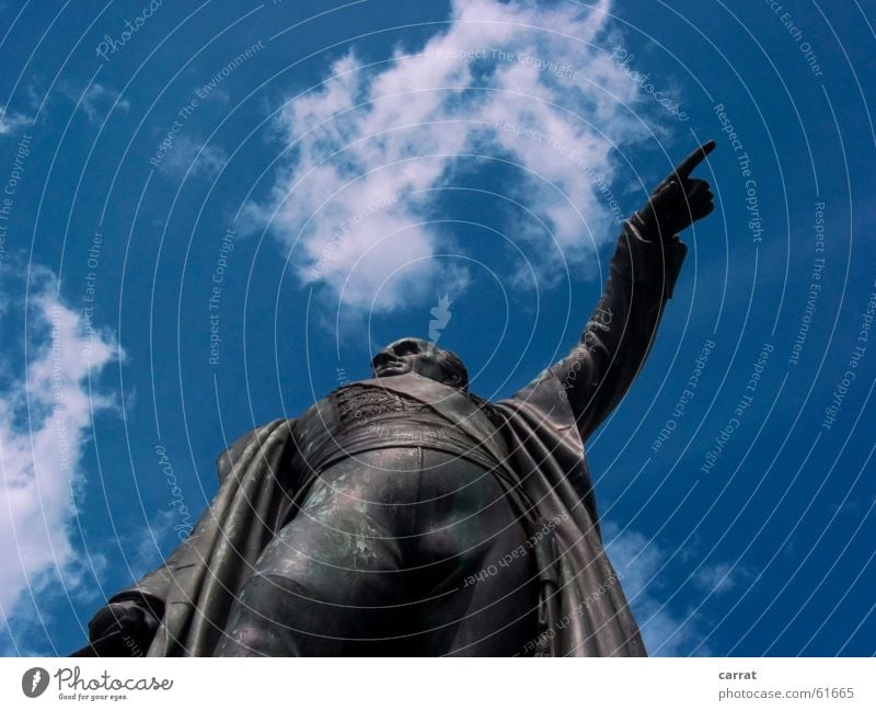 Show me the way... Statue Clouds Human being Indicate Blue Sky Signage Lanes & trails Road marking indicator that way it was him Where's the wind coming from?