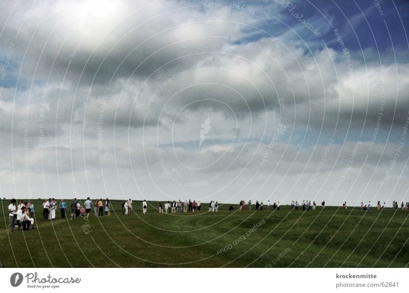 stones look Clouds Meadow Human being Accumulation Looking Tourist England Stonehenge Megalith monument Circle Mystic Mysterious Attraction Dark Storm clouds