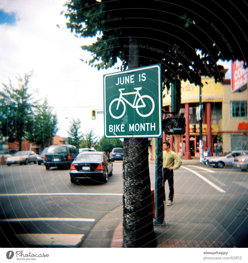 nose in the wind Vancouver Canada Transport Bicycle June Holga Medium format Tree Town Signs and labeling Street Signage Road traffic Crossroads City life