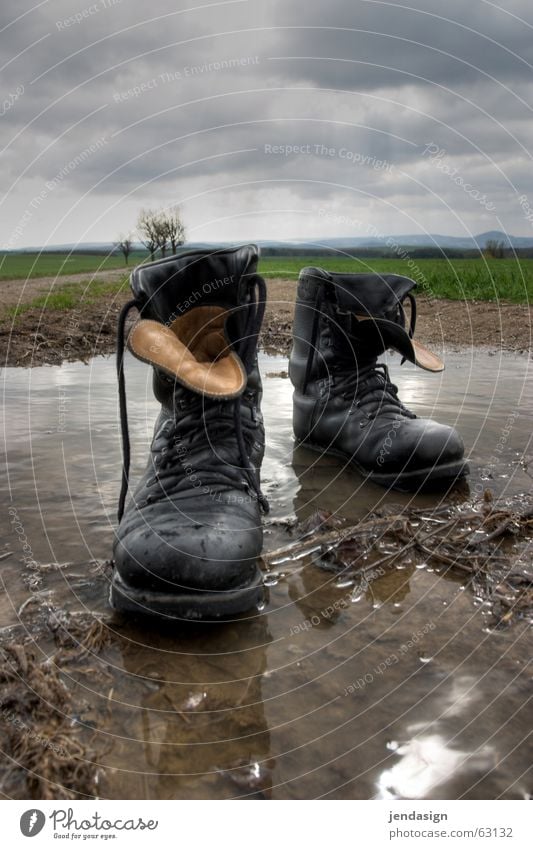 Boots off! Puddle Army Pacifist Shoelace Shoe sole In step Rain militarism Right Force antig violence Stride