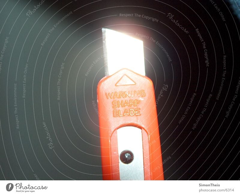 Warning sharp blade! Glittering Craft (trade) Cutter Knife reflection Orange Knives Sharp thing