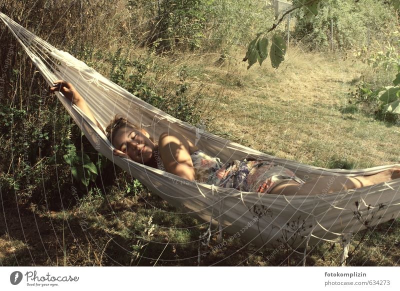 beautiful young woman slumbering in the hammock Young woman Woman Hammock Well-being relaxation To swing Relaxation Feminine Youth (Young adults) 1 To enjoy