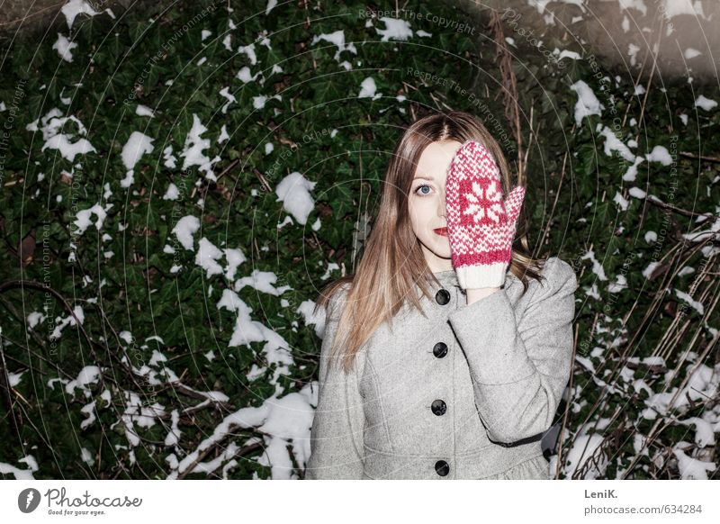 hide and seek Winter Snow Young woman Youth (Young adults) Hand Gloves Discover Smiling Looking Brash Free Happiness Curiosity Green Pink Freedom
