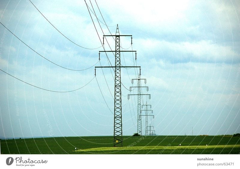 under current Electricity Electricity pylon Clouds Field Nature Sky Cable Metal Deep