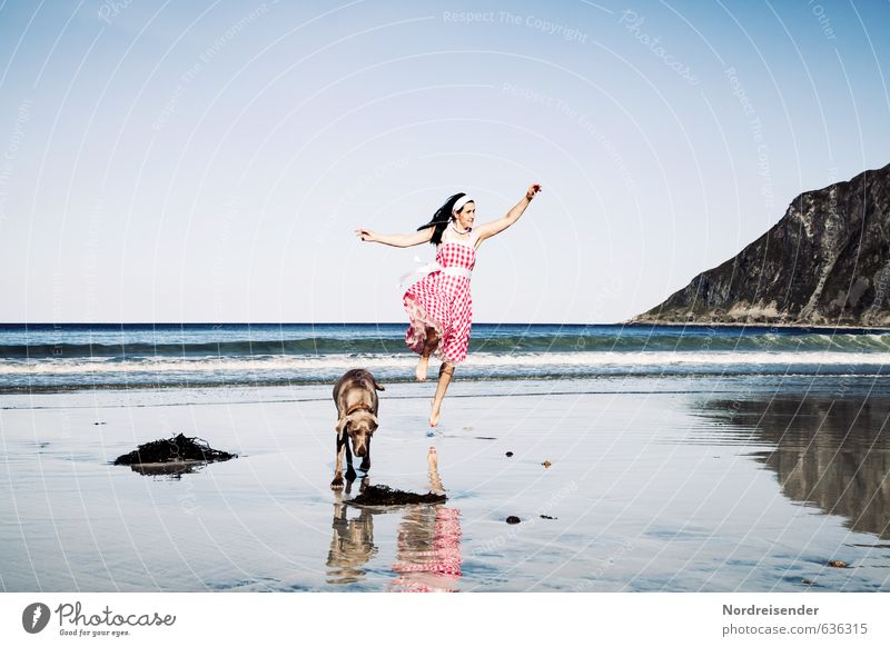 Dancing woman with dog on the beach Lifestyle Joy Happy Fitness Well-being Contentment Vacation & Travel Summer Summer vacation Sun Beach Ocean Feminine Woman