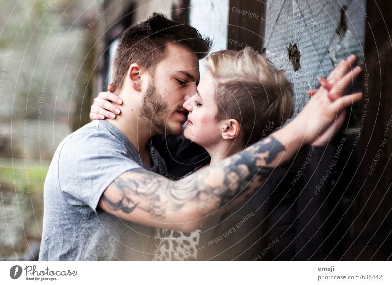 Hipster couple kissing Feminine Young woman Youth (Young adults) Young man Couple 18 - 30 years Adults Hip & trendy Kissing Passion Love Colour photo