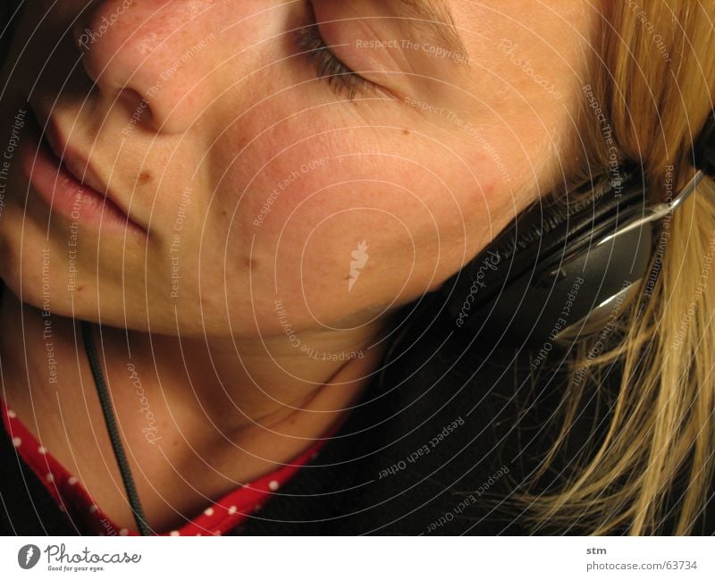 Half portrait of a woman with headphones Listening Dream Headphones Freckles Sense of hearing Stereo Emotions Sound Hi-fi Headset Music Nose Mouth Technology