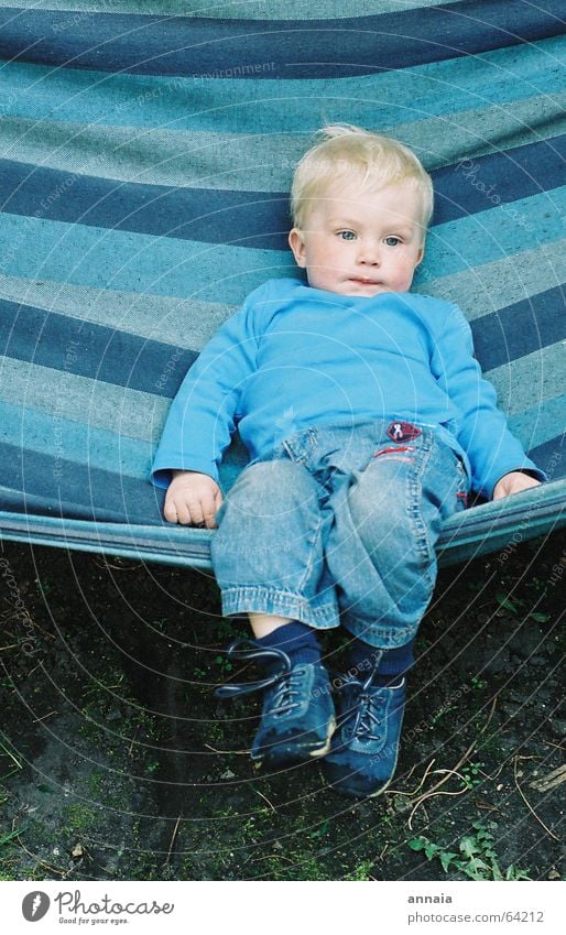 dreaming boy Child Hammock Stripe Dream Blonde Small Sleep Dreamily Relaxation Boy (child) Easygoing Candy Blue childhood Fatigue blue eyes Multicoloured Jeans