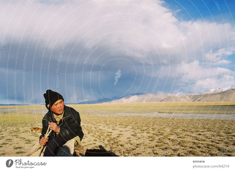 vast country Steppe Cap Sky Kyrgyzstan Adventure Calm Clouds Grass Far-off places Boy (child) boy Nike Rope Russia Russian on to new shores away from home