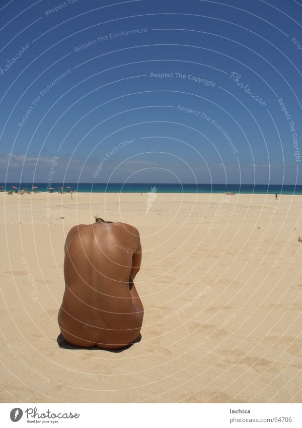 costa Sunbathing Beach Brown Ocean Woman Summer Vacation & Travel Calm Fuerteventura Grain of sand Break Hot Burn Headless Cramped Far-off places Loneliness