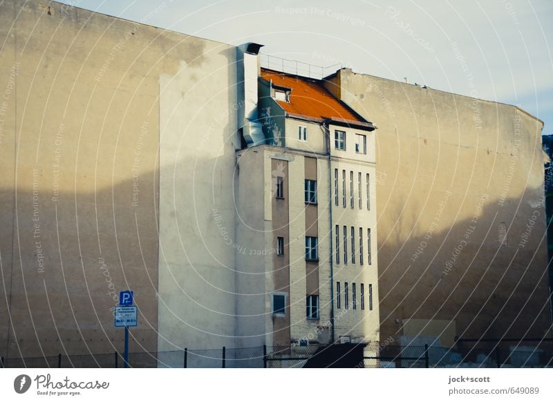 Centrally located Sky Downtown Berlin Facade Fire wall Ventilation shaft Road sign Historic Change Shadow play Diagonal Stick out Wire netting fence