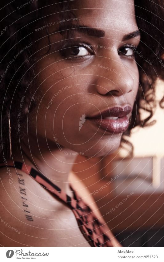 Lateral portrait of a beautiful, young, dark-skinned woman with a tattoo on her shoulder Young woman Youth (Young adults) Face Eyes Lips Tattooed 18 - 30 years