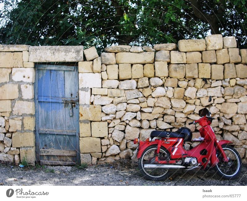 Moped Gozo Motorcycle Malta South Wall (barrier) Warmth dolce vita Mediterranean sea Door