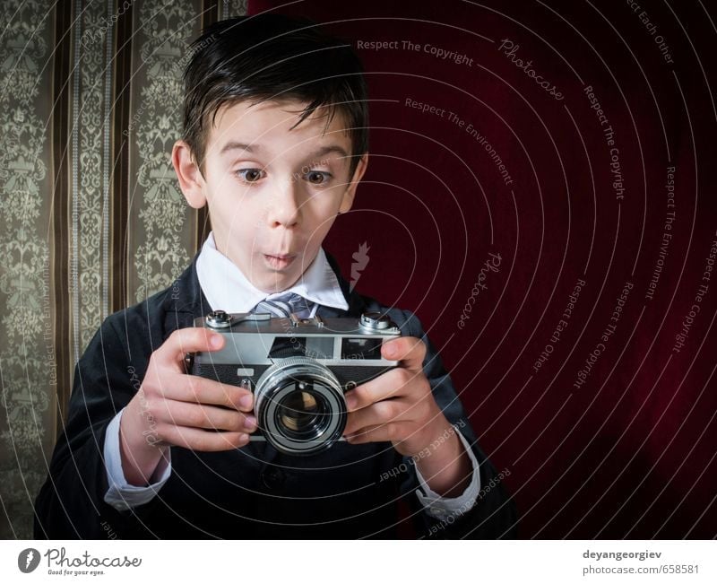 Boy with vintage camera Lifestyle Happy Child Camera Boy (child) Infancy Old Small Cute Retro White Nostalgia young Photography Caucasian Photographer kid