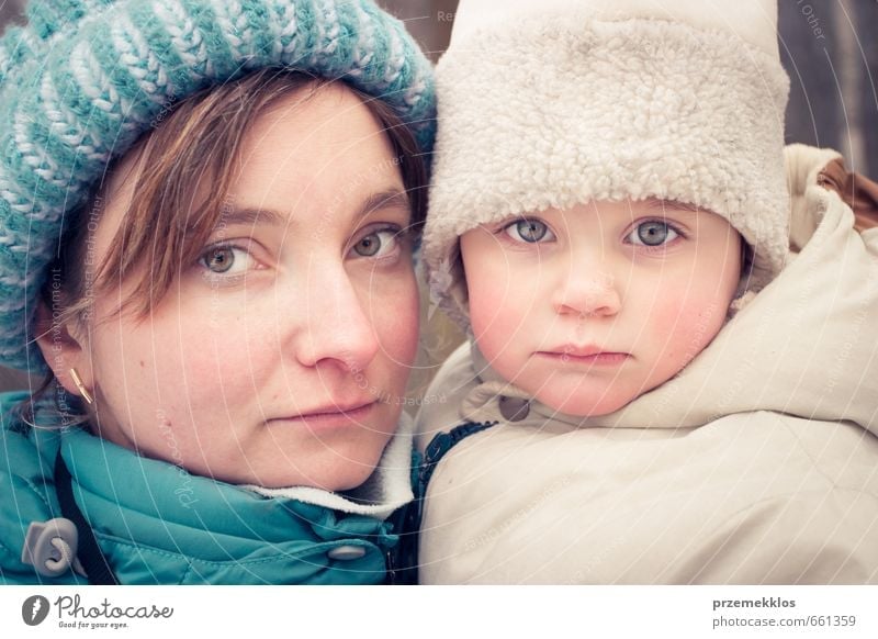 Portrait of mom and daughter at freeze day Winter Child Girl Woman Adults Mother Family & Relations 2 Human being 3 - 8 years Infancy 30 - 45 years Cap Freeze