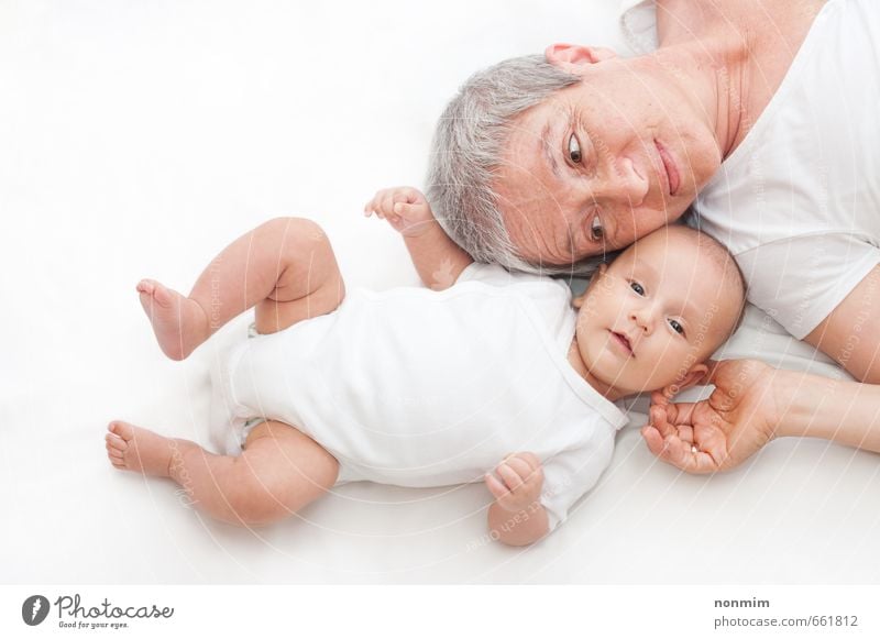 Grandmother and grandson playing on the ground Joy Happy Beautiful Face Child Human being Baby Toddler Boy (child) Woman Adults Female senior Grandparents