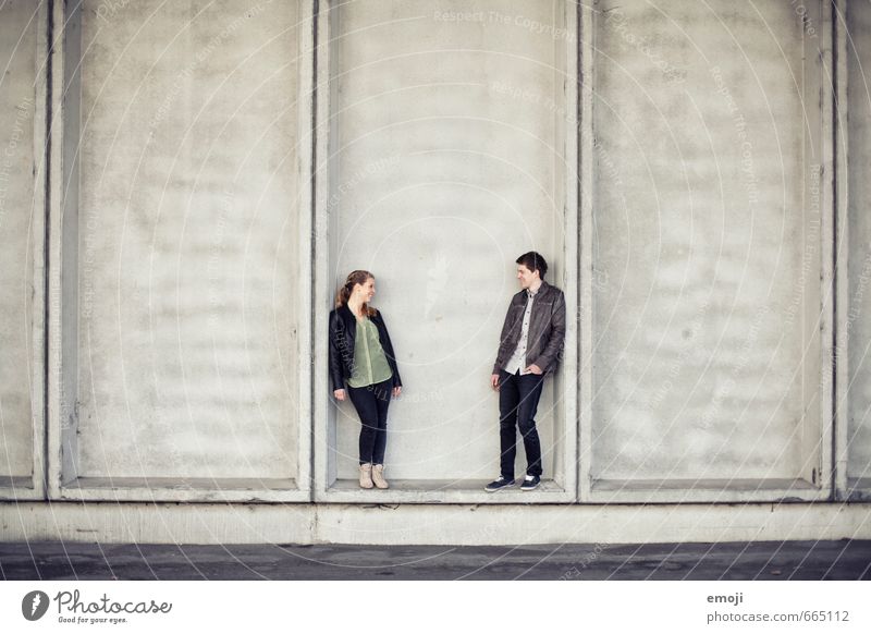 DUO Masculine Feminine Young woman Youth (Young adults) Young man Friendship Couple 2 Human being 18 - 30 years Adults Town Gray Colour photo Exterior shot