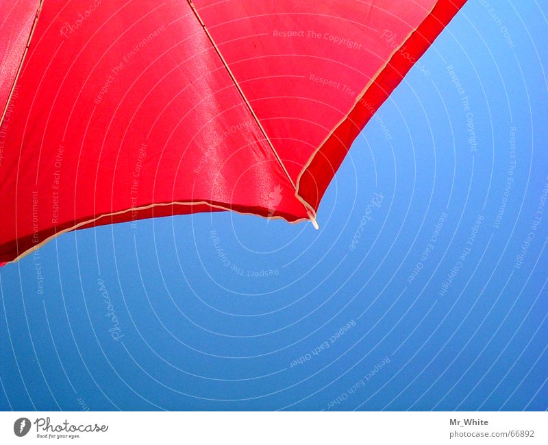 The parasol contrast Beach Ocean Physics Umbrella Sun Sand Warmth