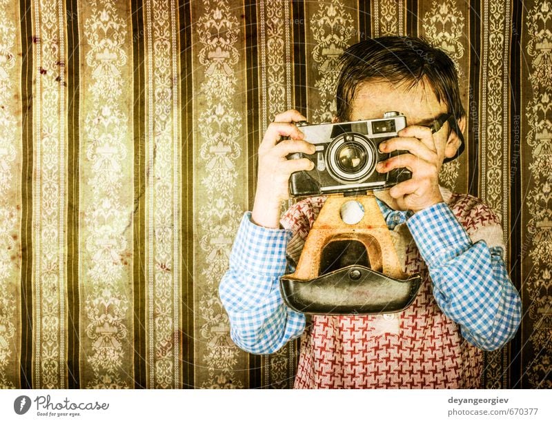 Boy with vintage camera Lifestyle Happy Child Camera Boy (child) Infancy Old Small Cute Retro White Nostalgia young Photography Caucasian Photographer kid
