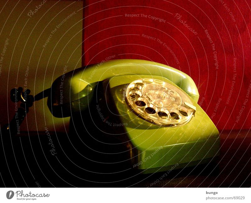 factum quiete Telephone Nostalgia Rotary dial Outer ear Listening Lie Analog Green Red Wallpaper Calm Style Converse Past Remember Memory Grief Communicate