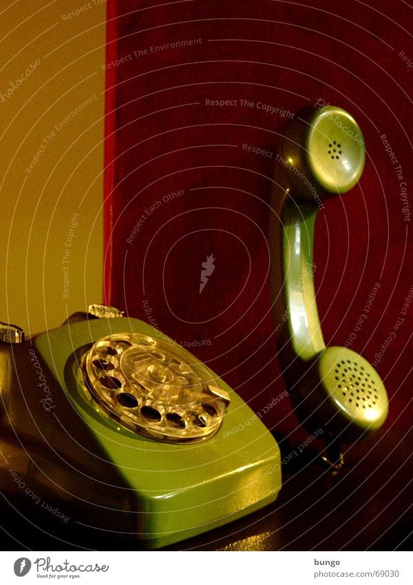 nulla adiuncta Telephone Nostalgia Rotary dial Outer ear Listening To talk Analog Green Red To call someone (telephone) Wallpaper Calm Style Converse Past