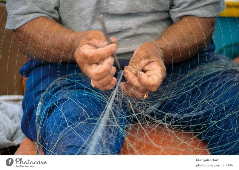 fisher Malta Marsaxlokk Fisherman Man Work and employment Hand T-shirt Pants Exterior shot Net Needle