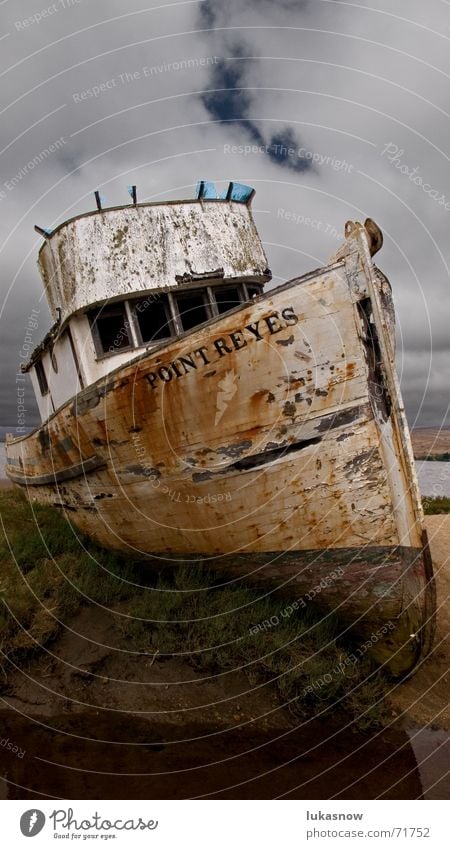 With the cutter over the field Fishing boat Field Dark Stranded Old Decline Watercraft Beach Derelict Wreck Thunder and lightning