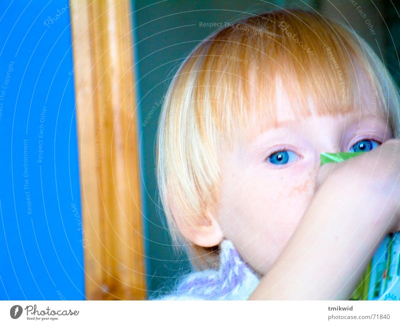 Eva Girl Child Juice drinking kitchen blue eyes contrast