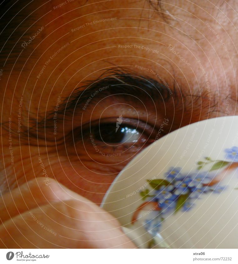 look me in the eye Eyebrow Man Cup Tea cup Lie (Untruth) Provocative Laugh lines Fingers Interior shot Drinking Coffee cup Flowery pattern Hand Eyes Human being