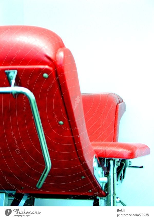 torture chair Seventies Red Leather Steel Isolated Image Chair Metal Rivet Rear view Design Designer furniture Partially visible Section of image
