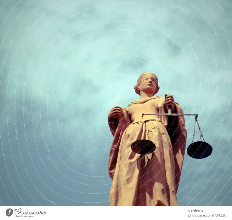 Justitia in a cloudy sky Justice Sculpture Statue Monument Dress Scale Stone Fairness Advice Stand Argument Famousness Blue Virtuous Truth Honest Wisdom