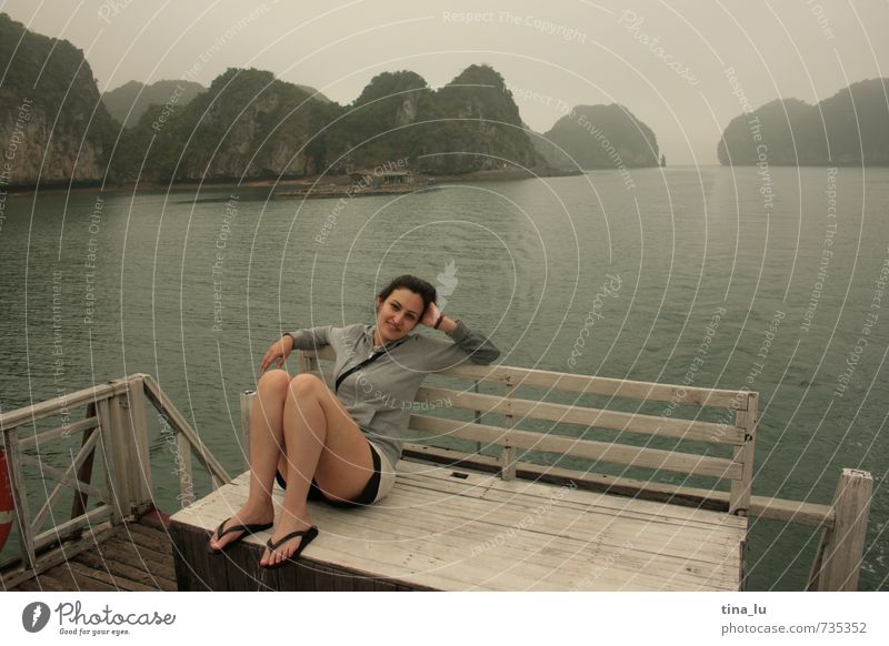 Halong Bay IV Feminine Young woman Youth (Young adults) Woman Adults 1 Human being 18 - 30 years Elements Clouds Weather Rock Mountain Coast Island Halong bay
