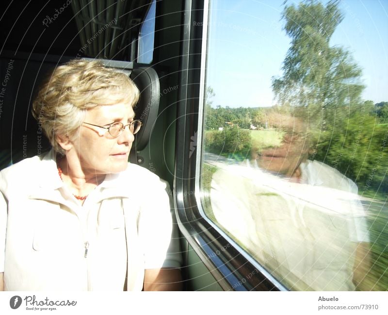 ...in thoughts already in Munich Woman Bavaria Chiemgau Reflection Train travel Vacation & Travel Railroad db reverse bayernticket