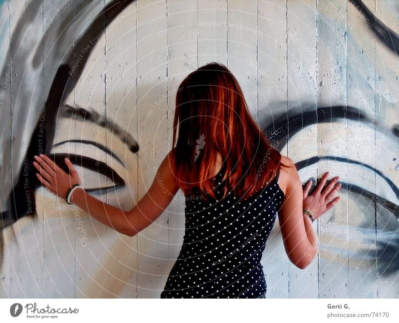 eyes to and through Woman Young woman Lean To hold on Upper body Hand Bracelet Long-haired Red-haired Rotate Spotted Wall (building) Wall (barrier)