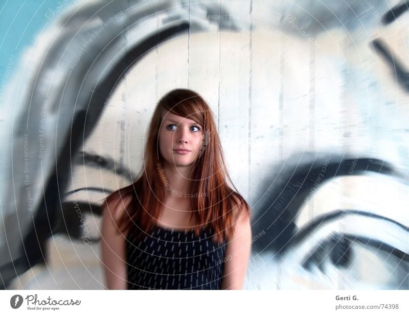 between the eyes Blur Woman Young woman Upper body Long-haired Red-haired Beautiful Friendliness Shoulder Wall (building) Mural painting Portrait photograph