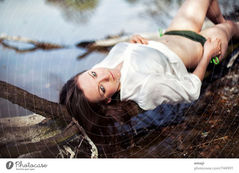lakeside Feminine Young woman Youth (Young adults) 1 Human being 18 - 30 years Adults Summer Lakeside Lie Eroticism Colour photo Exterior shot Day