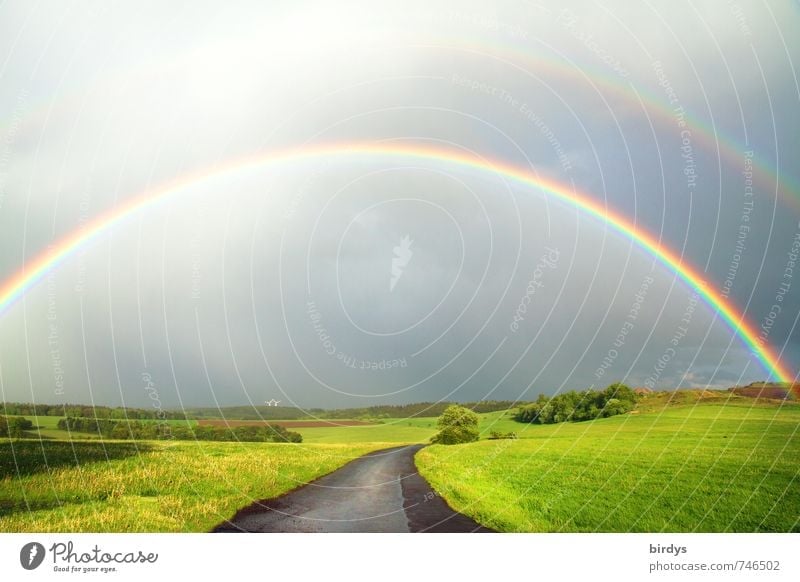 two rainbows over green landscape with dirt road Rainbow Nature off Landscape Elements Storm clouds Rainbows Horizon Spring Summer Meadow Street Illuminate
