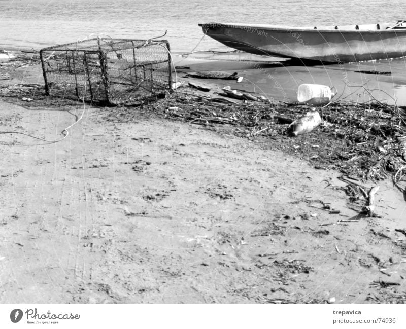 boat Fishing boat Fishery Beach Stranded Calm Fishing net Dirty Empty Black & white photo Boat on the beach Water Danube Sand River die of fish Loneliness
