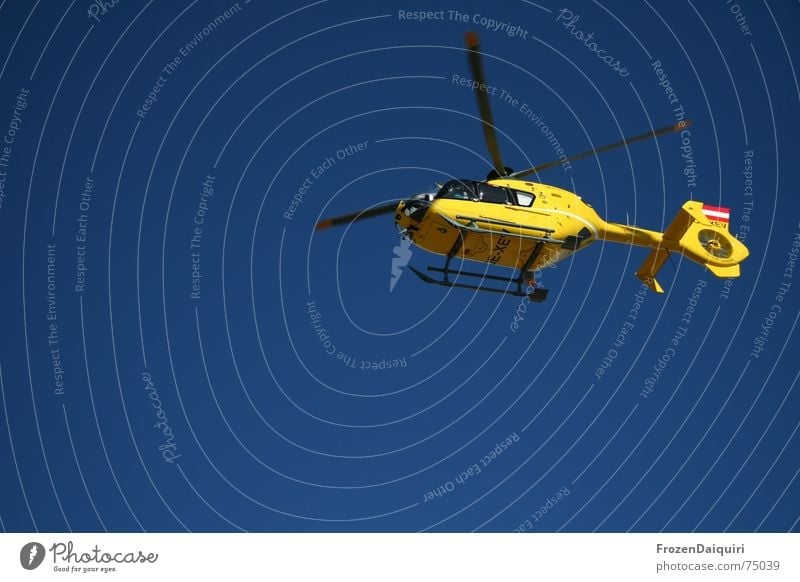 Christopher Helicopter Rescue First Aid Rescue helicopter Yellow Help Aviation Blue Sky Rotor air rescue Flying Floating Isolated Image Bright background