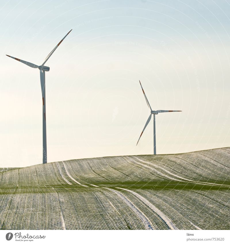 greenEnergy Energy industry Wind energy plant Field Hill Rotate Green Movement Future Pinwheel Line Snowfall Frost Winter Exterior shot Deserted Copy Space top