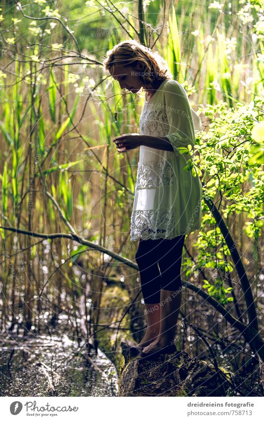 Discovery at the dark pond Elegant Human being Feminine Young woman Youth (Young adults) 1 Nature Plant Water Beautiful weather Pants Dress Observe Looking