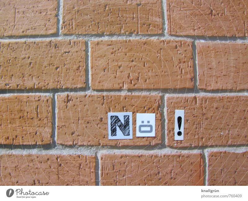 Nope! Wall (barrier) Wall (building) Brick Sign Characters Communicate Sharp-edged Rebellious Town Brown Black White Emotions Moody Cool (slang) Willpower