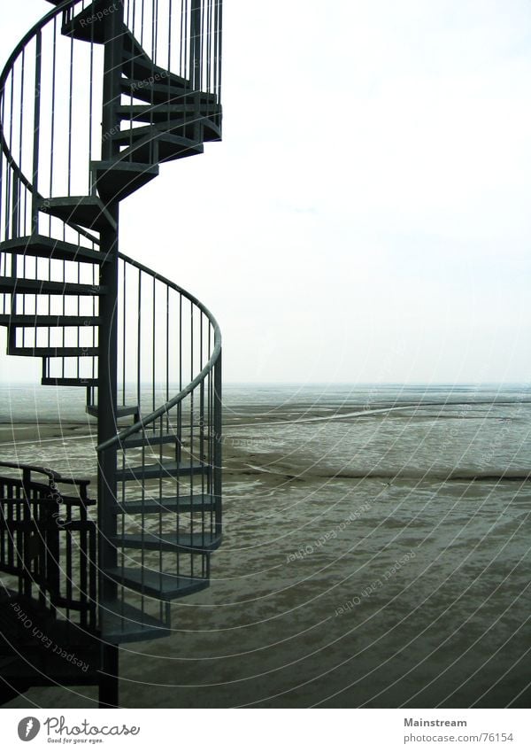 Stairs to the sea Winding staircase Ocean Horizon Water Mud flats Architecture
