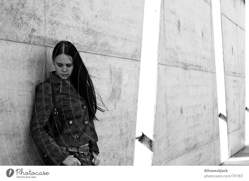 lee Woman Girl Wall (building) Concrete Black White Exterior shot Black-haired Timidity Wind Loneliness Gloomy Gray Black & white photo Hair and hairstyles Wait