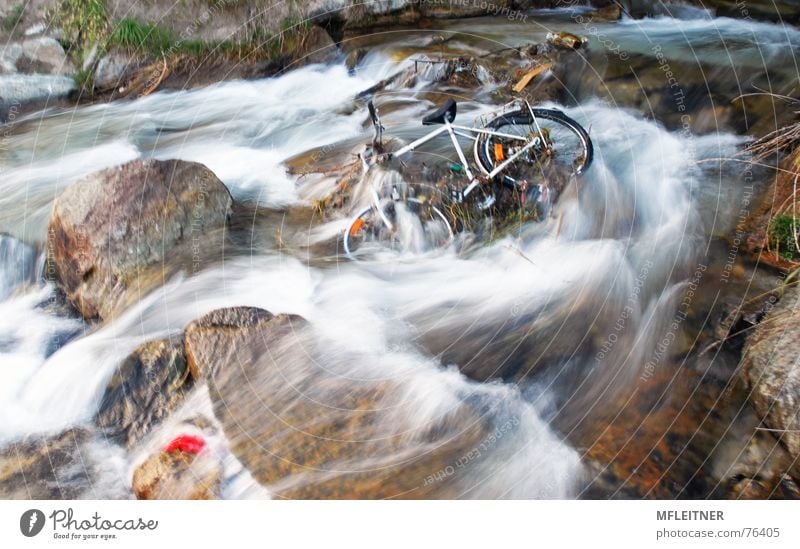 there is a bicycle in the river Federal State of Tyrol Austria water austira motion tyrol